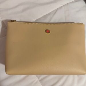 Bvlgari Emirates tan amenity kit with beauty items as pictured!